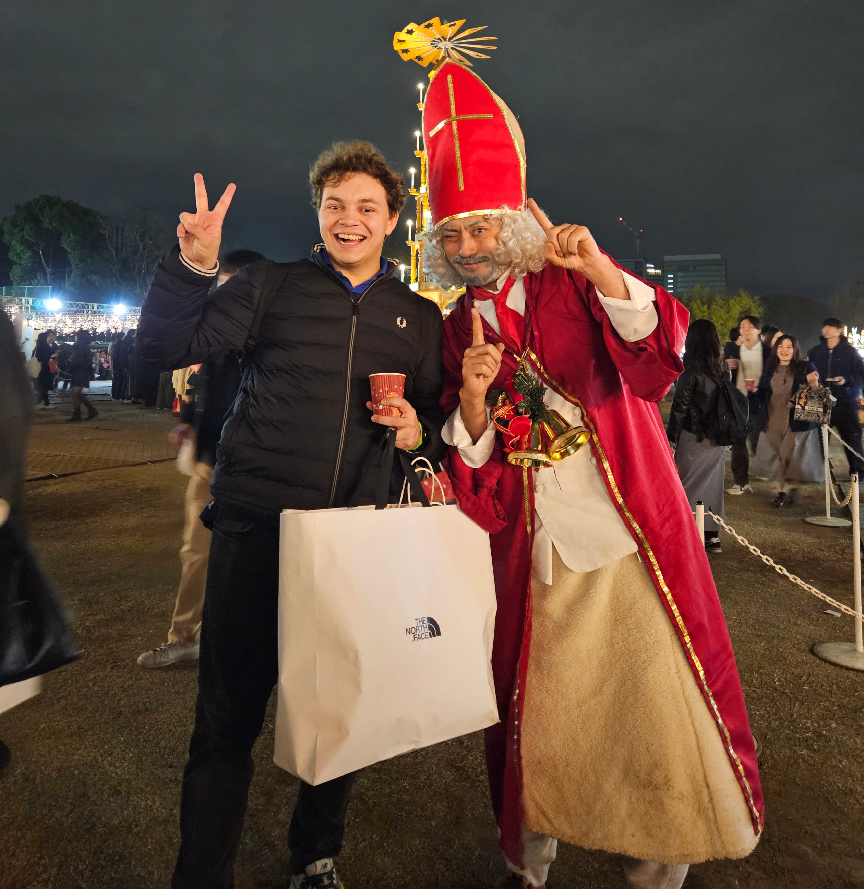 St. Nicholas at the Tokyo Christmas Market, a Japanese man bringing a unique cultural twist to the festive atmosphere