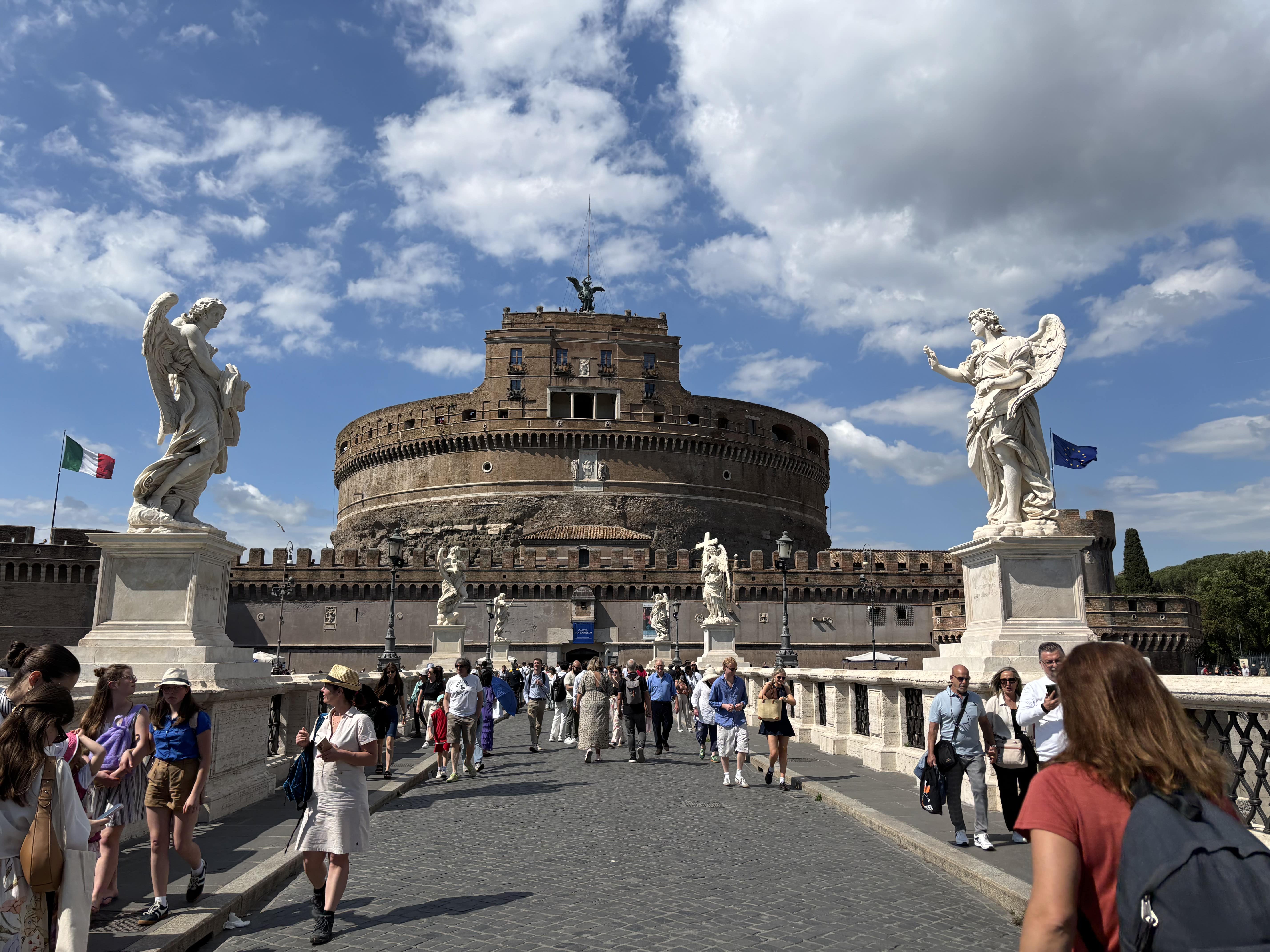 View of Castel Sant’Angelo from the Ponte Sant’Angelo bridge during our Castel Sant’Angelo visit on the way to Vatican, part of our perfect one-day walking itinerary in Rome.